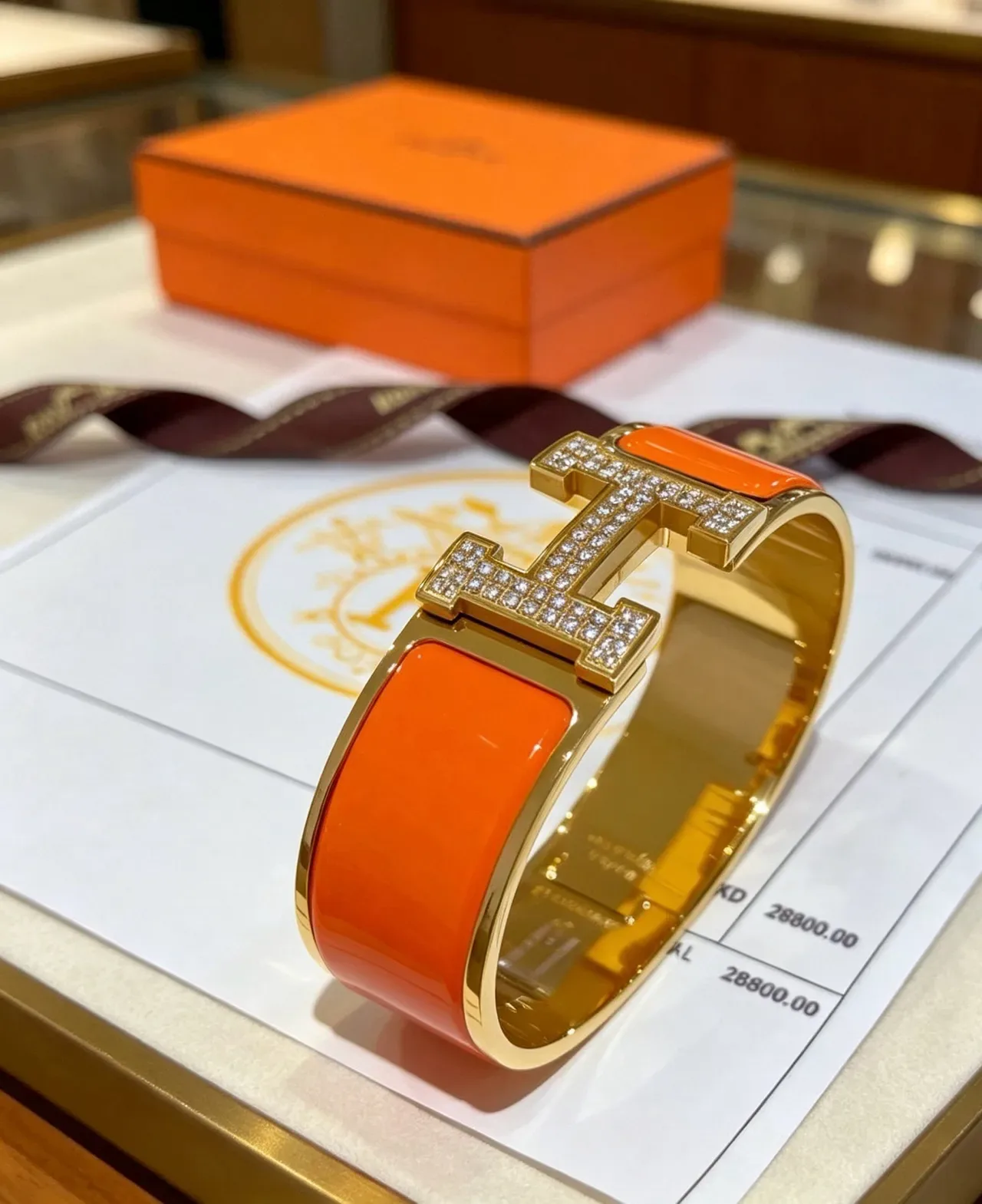Hermès Clic H Orange Enamel Paved Crystal Gold-Tone Bracelet 7