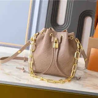 Louis Vuitton Beige Gold Monogram-Embossed Leather Chain Strap Bucket Bag
