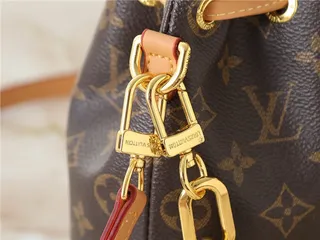 Louis Vuitton Beige Gold Monogram-Embossed Leather Chain Strap Bucket Bag 5
