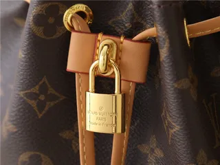 Louis Vuitton Beige Gold Monogram-Embossed Leather Chain Strap Bucket Bag 6