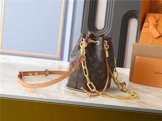 Louis Vuitton Beige Gold Monogram-Embossed Leather Chain Strap Bucket Bag 9