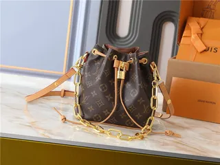Louis Vuitton Beige Gold Monogram-Embossed Leather Chain Strap Bucket Bag 10