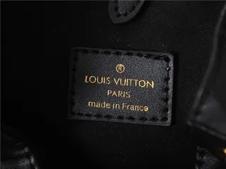 Louis Vuitton Beige Gold Monogram-Embossed Leather Chain Strap Bucket Bag 12