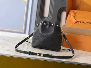 Louis Vuitton Beige Gold Monogram-Embossed Leather Chain Strap Bucket Bag 17