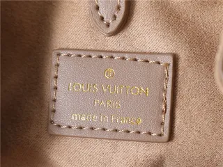 Louis Vuitton Beige Gold Monogram-Embossed Leather Chain Strap Bucket Bag 21