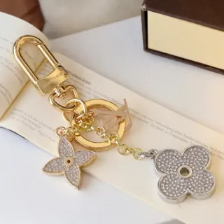 Louis Vuitton Suporte de Chaves Flor Ouro e Prata Encanto de Cristal Joalheria