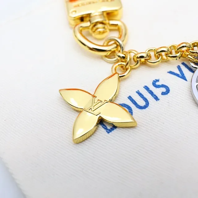 Louis Vuitton سوار ذهبي أسود معدني متعدد التشكيل 9