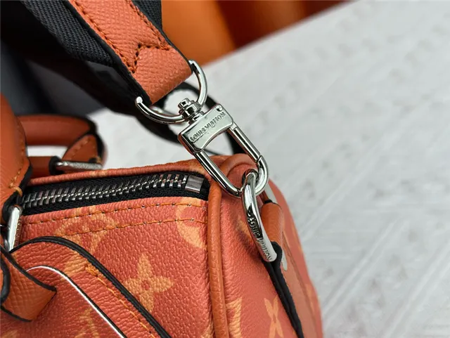 Louis Vuitton Keepall Negro Naranja Monogram Canvas Silueta de Barril Bolso Boston 4