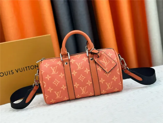 Louis Vuitton Keepall Negro Naranja Monogram Canvas Silueta de Barril Bolso Boston 10
