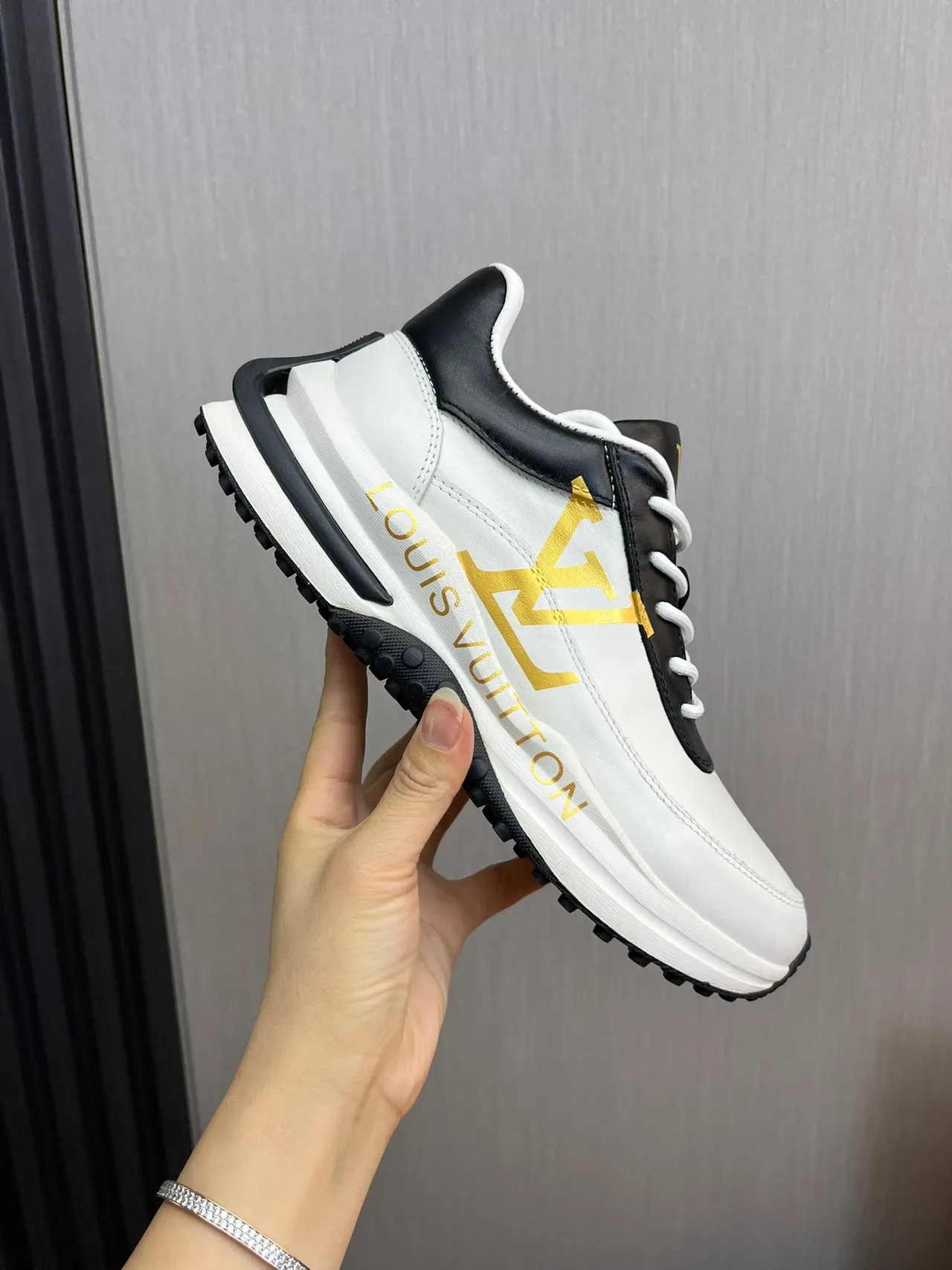 Louis Vuitton LV Trainer White Black Leather Upper Monogrammed Side Panel Lifestyle Sneakers 4