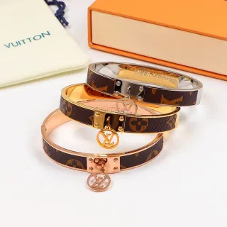 Louis Vuitton Monogram سوار بني ذهبي مفصل جلد