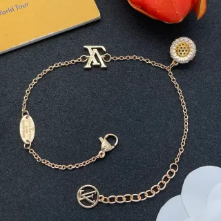 سوار Louis Vuitton Monogram ذهبي وفضي مع تعليقات