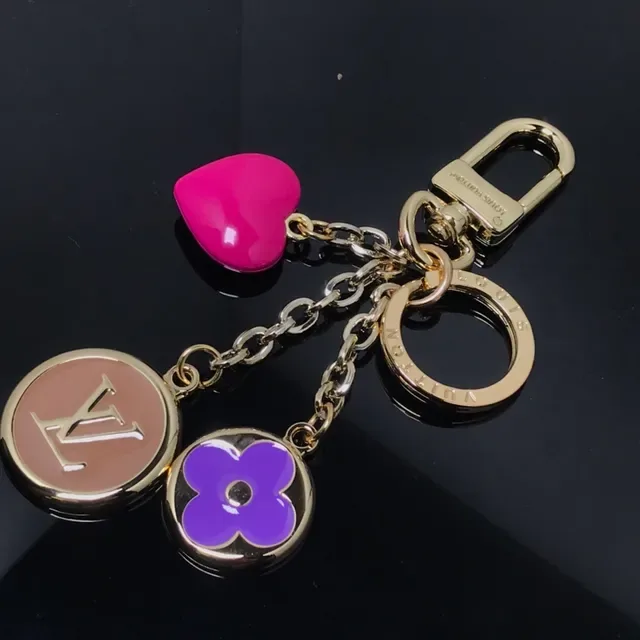 Louis Vuitton Pulseira Charms Esmalte Metal Dourado Rosa e Roxo 3