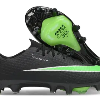 Nike Chaussures de football noires vertes avec upper Flyweave Knit rayure néon acentuée pour terrain ferme