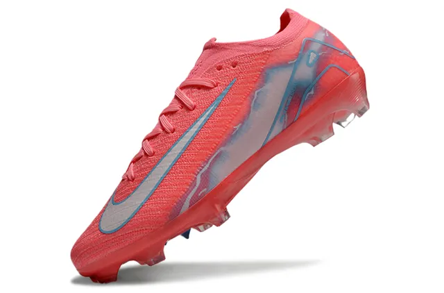 Nike Mercurial Vapor rosa e azul de corte baixo com upper de malha cadarços assimétricos e campo firme 3