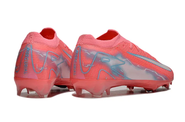Nike Mercurial Vapor rosa e azul de corte baixo com upper de malha cadarços assimétricos e campo firme 5