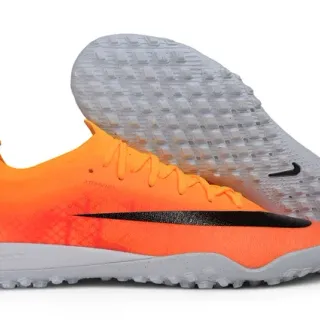 Nike Tênis de futebol turf com upper de malha laranja preto, gola baixa