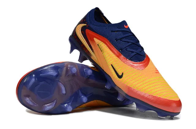 Nike Phantom GT Sapatos de futebol Navy Orange de corte baixo com upper de malha e cordões assimétricos para grama firme 3