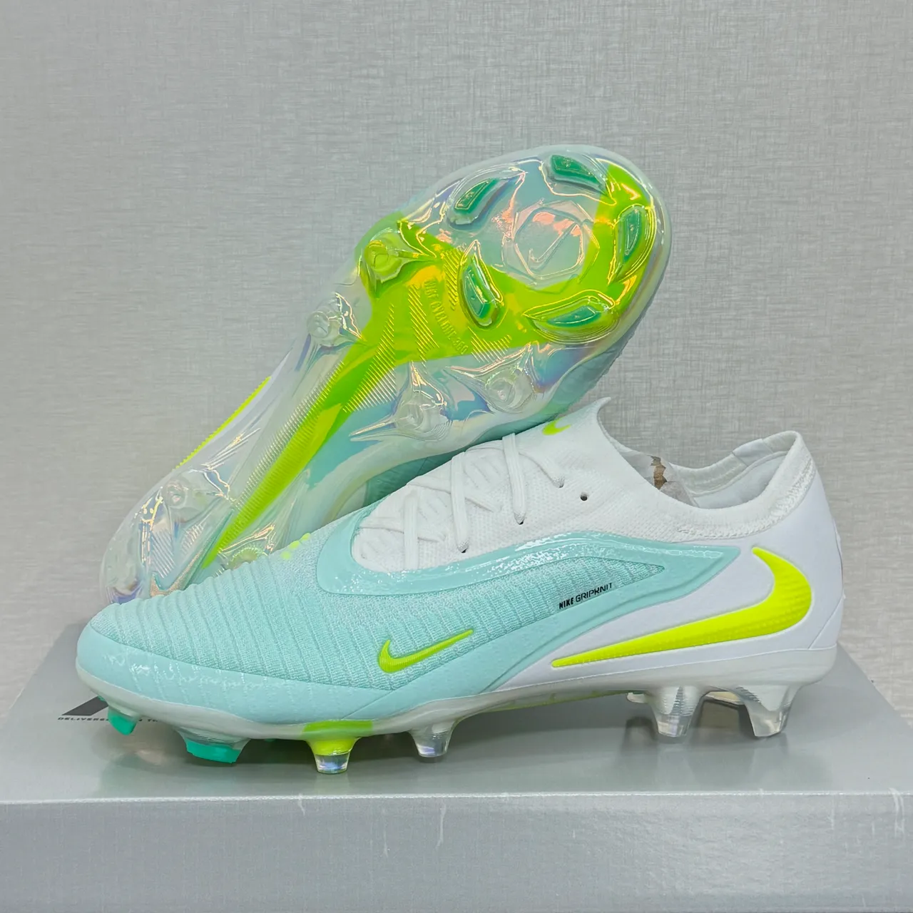 Nike Phantom GT Orange Bleu Coupe Basse Tricot Supérieur Lacets Asymétriques Terrain Firme Chaussures de Football 3