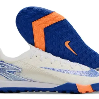 Nike Sapatos de futebol turf com upper de knit e overlays sintéticos branco e azul