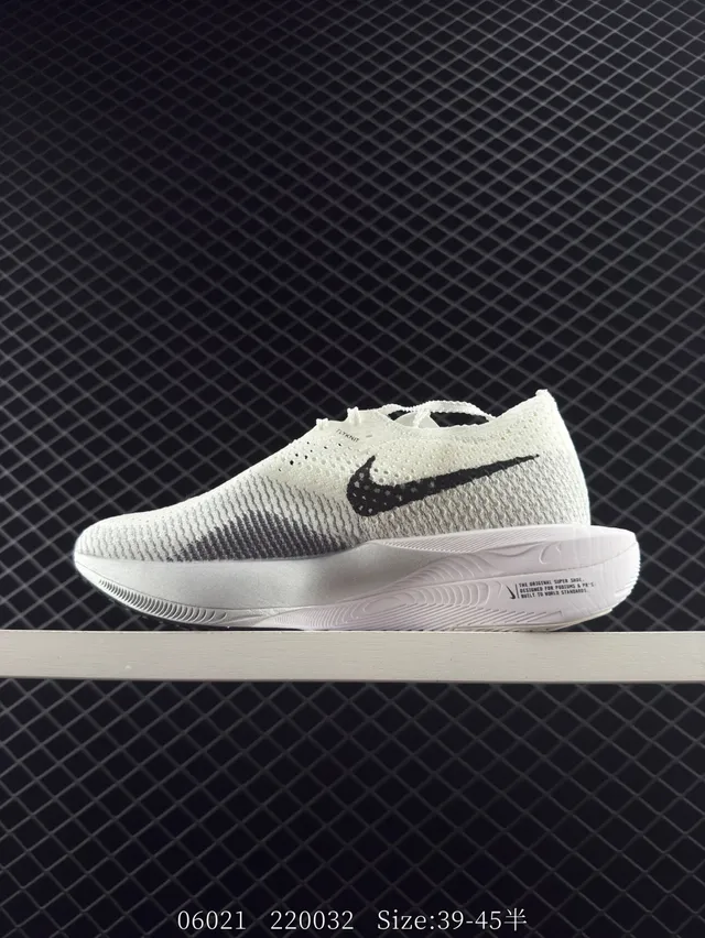 Nike ZoomX White Black Engineered Knit Upper Asymmetric Lacing Running Shoes 5
