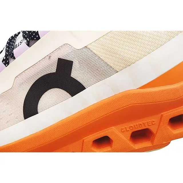 On Cloudmonster Orange and Cream Lifestyle Sneakers 2