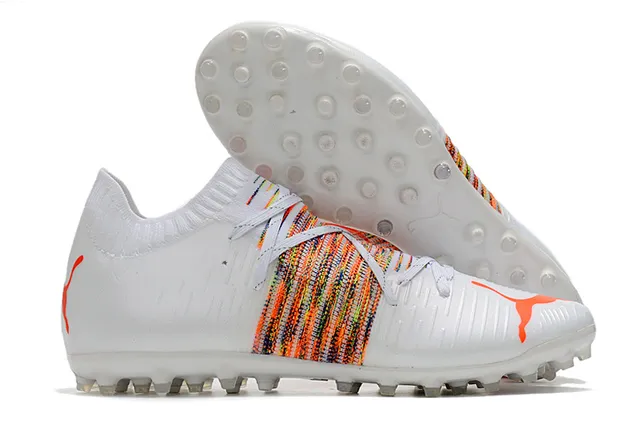 Puma Future Z Chaussures de football orange et jaune avec upper en knit, ajustement sock-fit, cage à lacets intégrée, terrain ferme 4