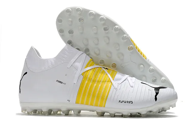 Puma Future Z Chaussures de football orange et jaune avec upper en knit, ajustement sock-fit, cage à lacets intégrée, terrain ferme 13