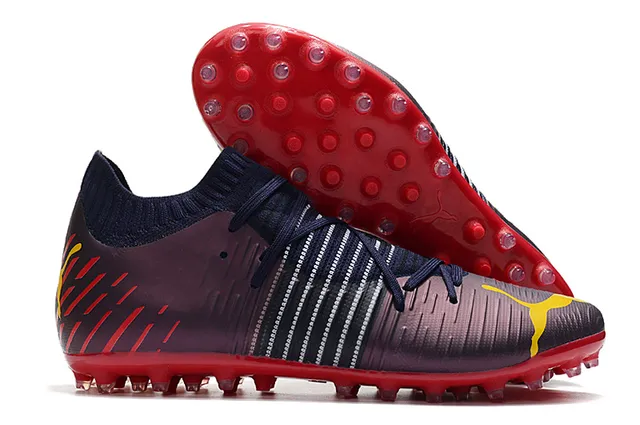 Puma Future Z Chaussures de football orange et jaune avec upper en knit, ajustement sock-fit, cage à lacets intégrée, terrain ferme 14