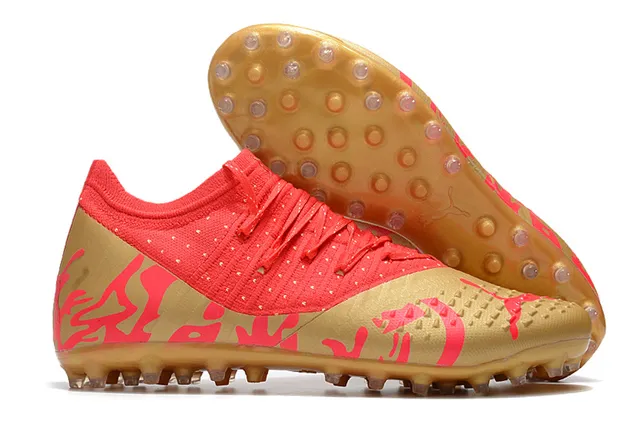 Puma Future Z Chaussures de football orange et jaune avec upper en knit, ajustement sock-fit, cage à lacets intégrée, terrain ferme 20