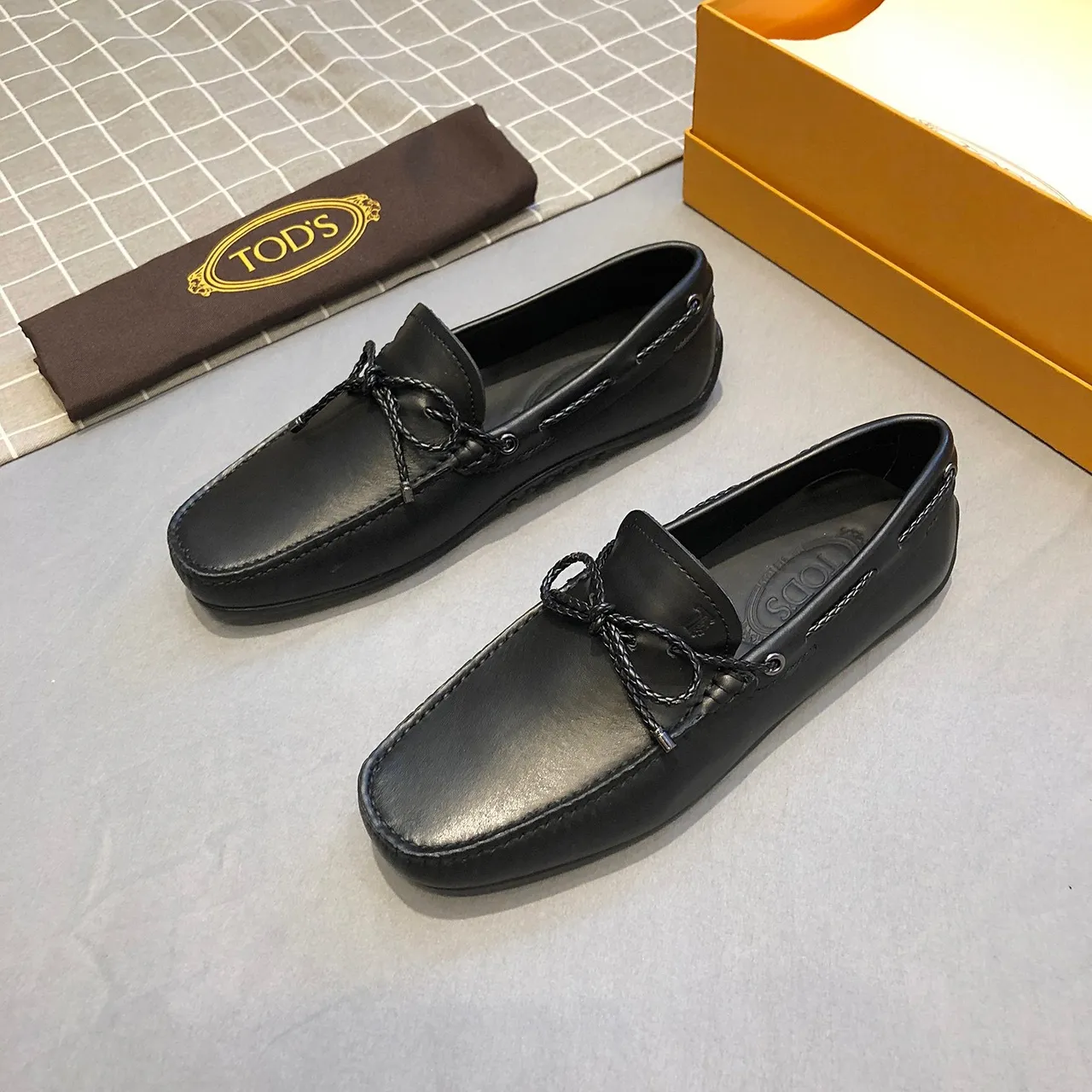 Tod's Gommino Bow جلد أسود مصقول مع تفاصيل حبل مربوط لؤفير 2