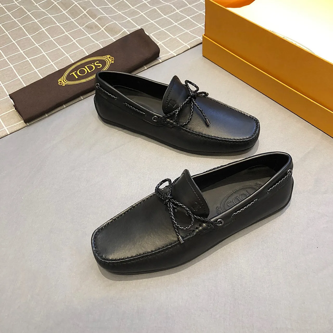 Tod's Gommino Bow جلد أسود مصقول مع تفاصيل حبل مربوط لؤفير 3