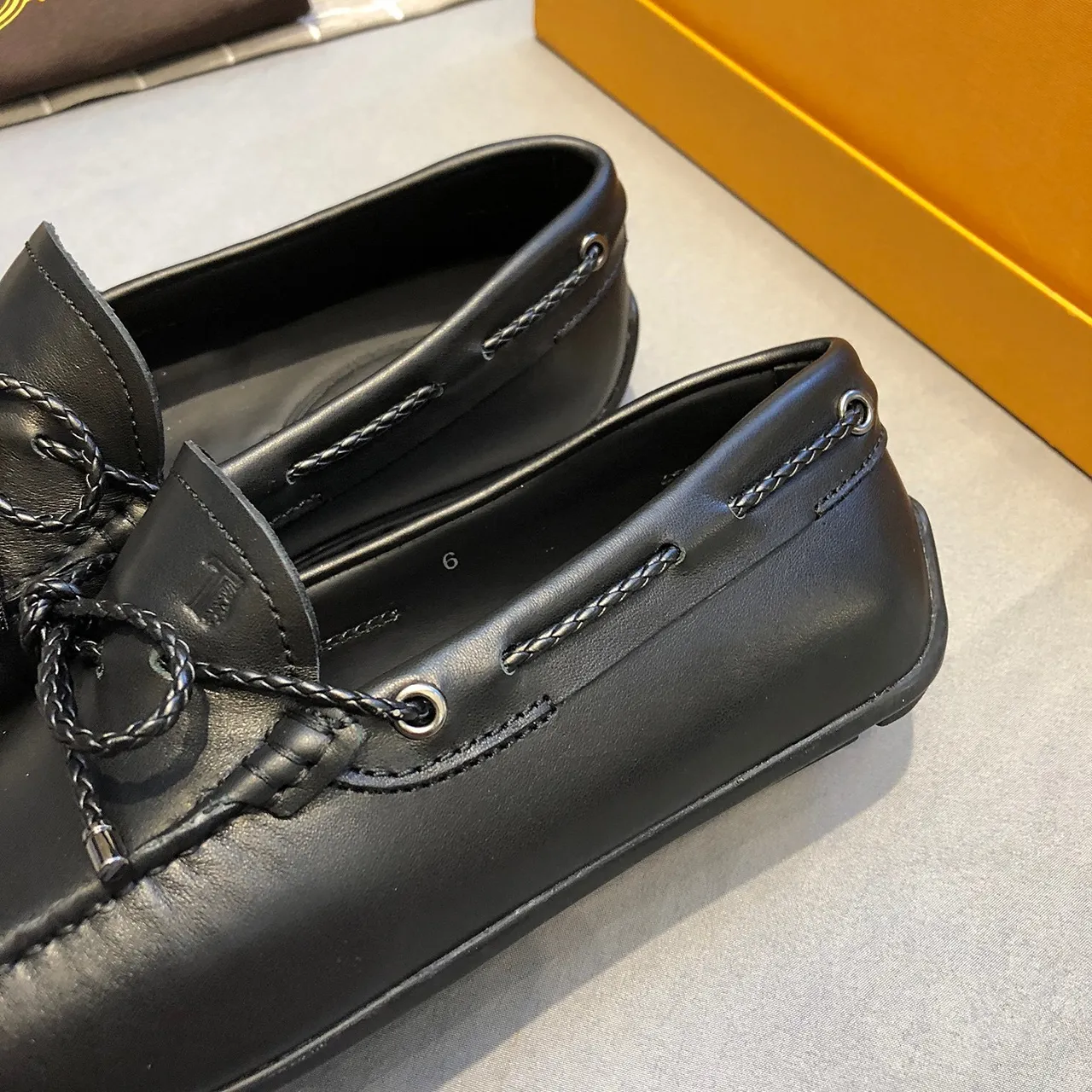 Tod's Gommino Bow جلد أسود مصقول مع تفاصيل حبل مربوط لؤفير 6