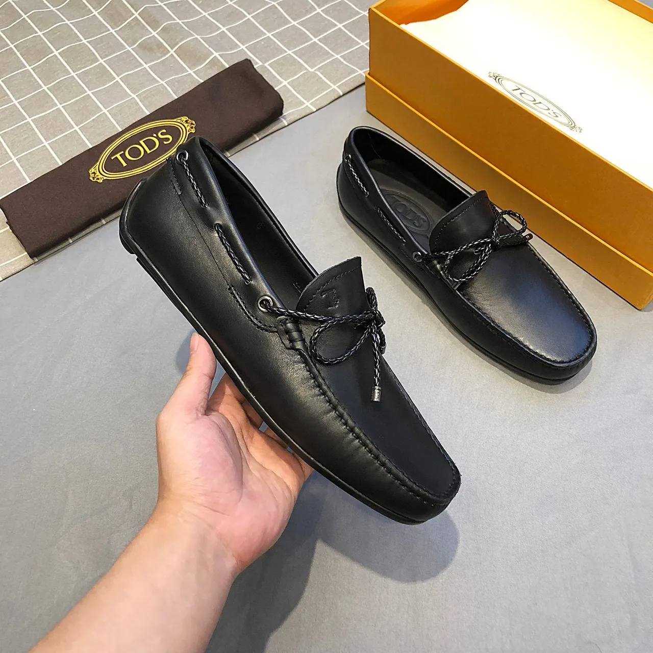 Tod's Gommino Bow جلد أسود مصقول مع تفاصيل حبل مربوط لؤفير 9