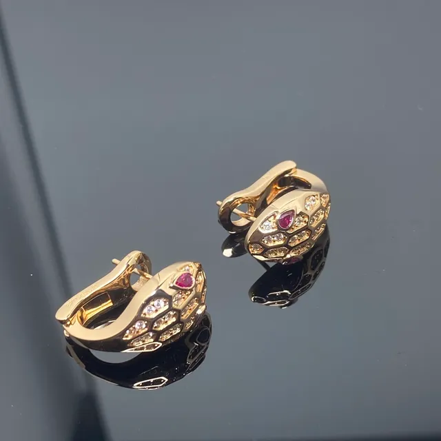 Van Cleef & Arpels Serpent Bohème Yellow Gold Diamond and Ruby Earrings 3