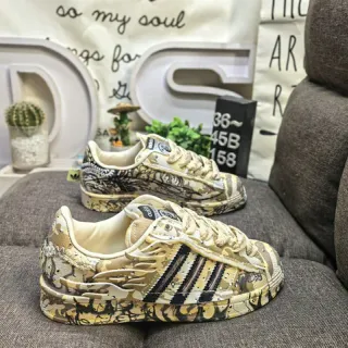 Adidas بيج أسود كامو فلاج طباعة تداخل شيل تو كاب نمط حياة حذاء رياضي