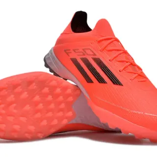 Adidas F50 Orange Black Sapatos de futebol para grama com cano baixo em material sintético e crampons moldados