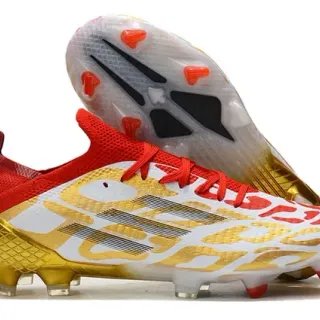 Adidas Zapatos de fútbol blanco y oro bajos con rejilla para terreno firme
