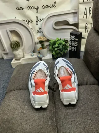 Adidas সাদা কমলা পারফোরেটেড মেশ আপার থ্রি-স্ট্রাইপ সাইড ব্র্যান্ডিং রানিং জুতা 8