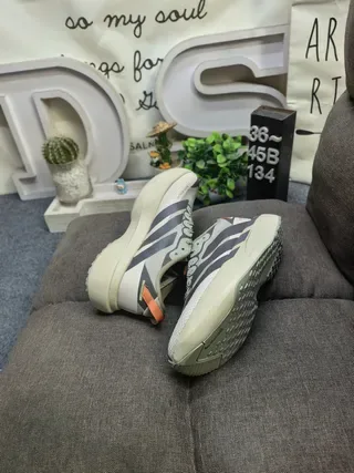 Adidas Xplorer Evo SL ATR Beige Gray Orange tênis lifestyle 16