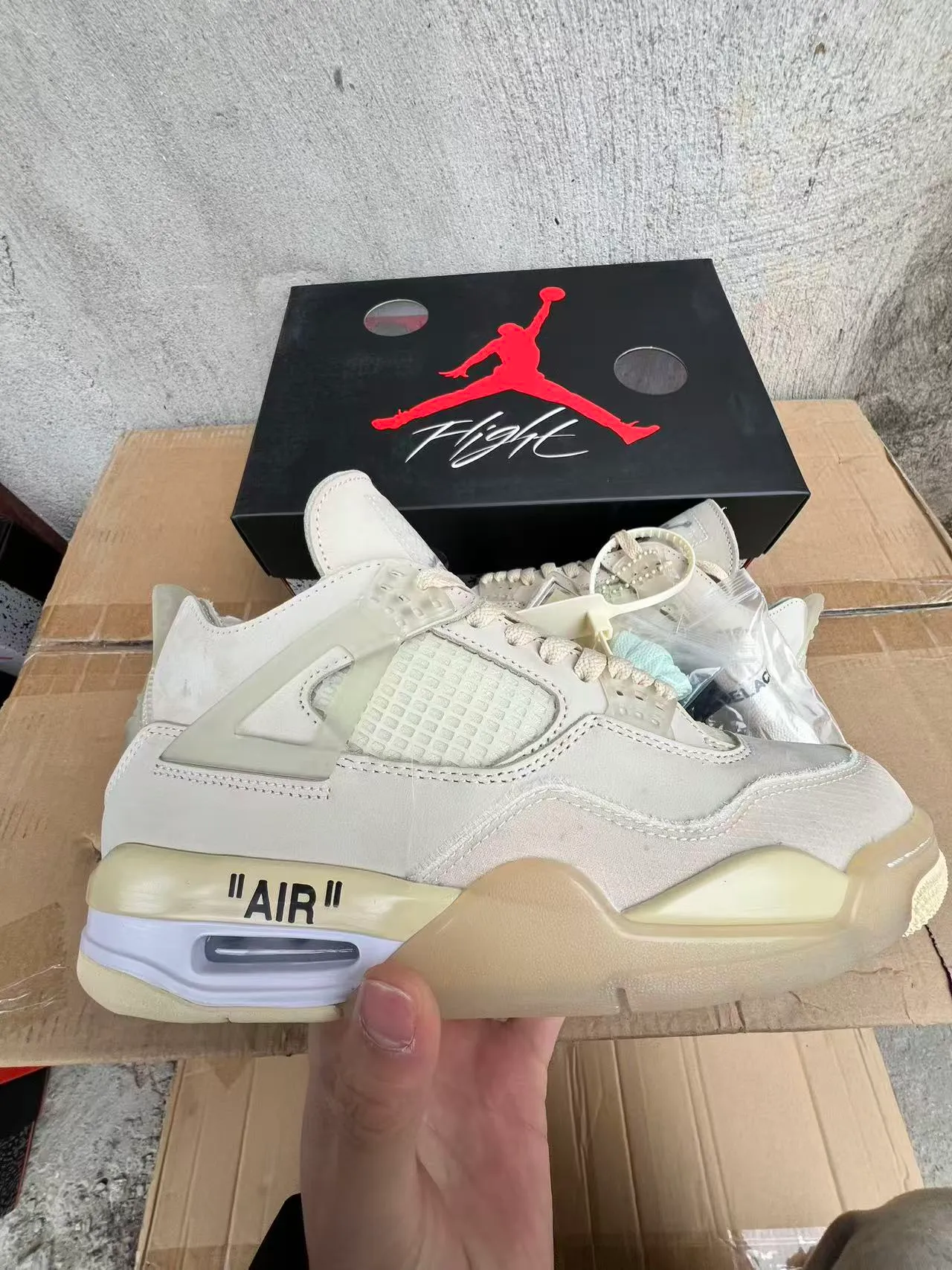 Zapatillas de baloncesto lifestyle Air Jordan 4 Off-White beige 7