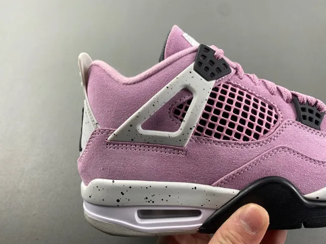 Zapatillas de baloncesto Air Jordan 4 de ante rosa y blanco moteado 3