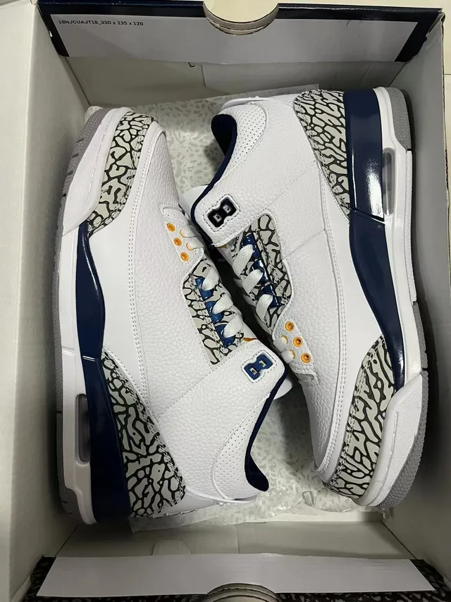 Chaussures de basketball montantes Air Jordan à motif éléphant blanc et bleu marine 6