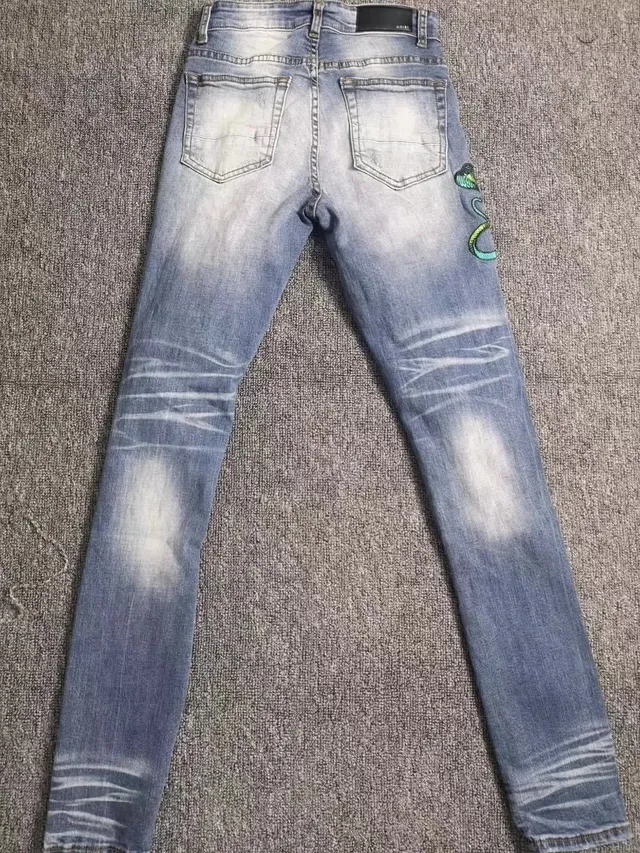 Amiri أزرق أخضر distressed embroidered بناطيل جينز 6
