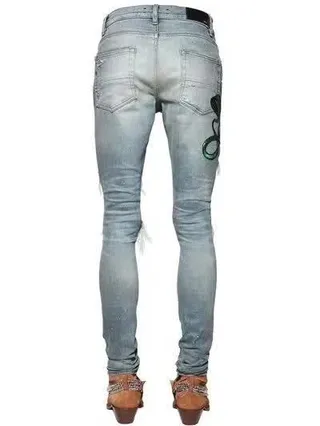 Amiri أزرق أخضر distressed embroidered بناطيل جينز 8