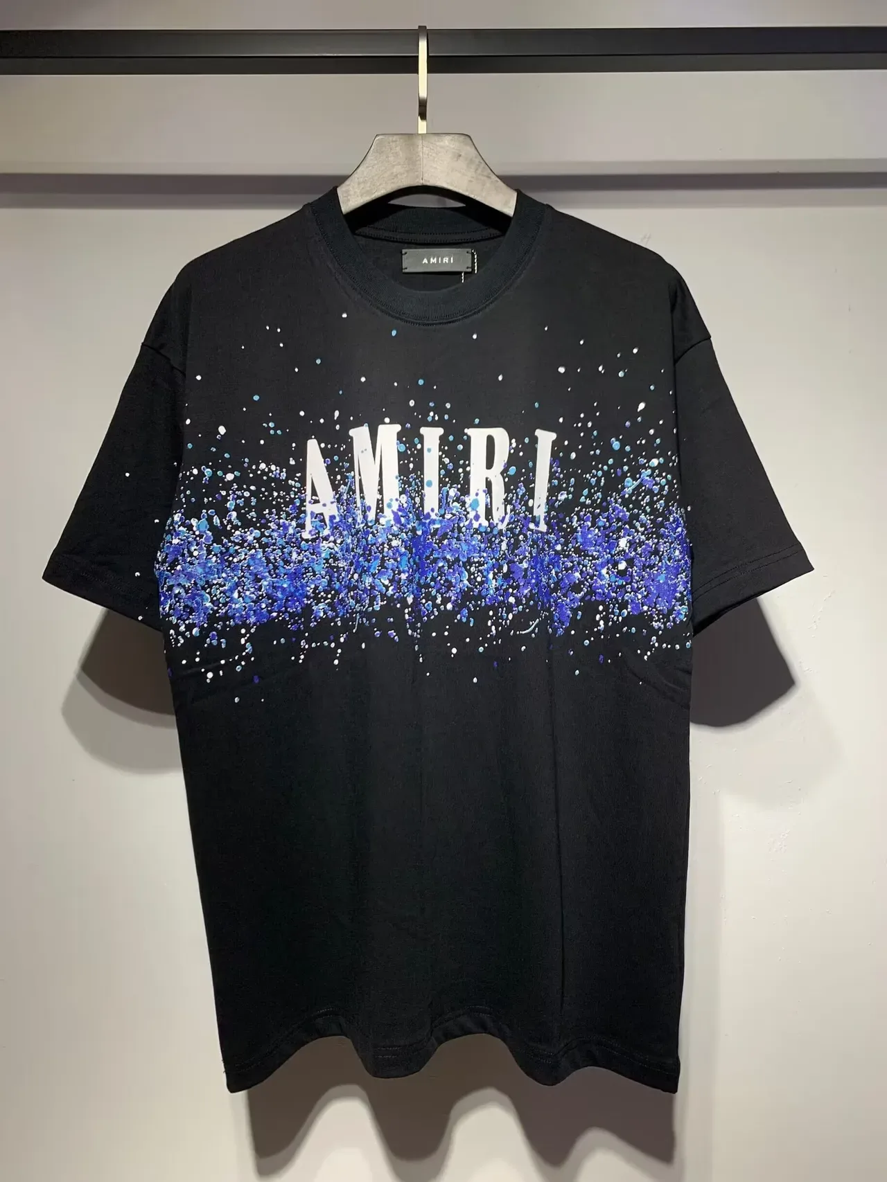 Camiseta Amiri com logo gráfico de respingos 9