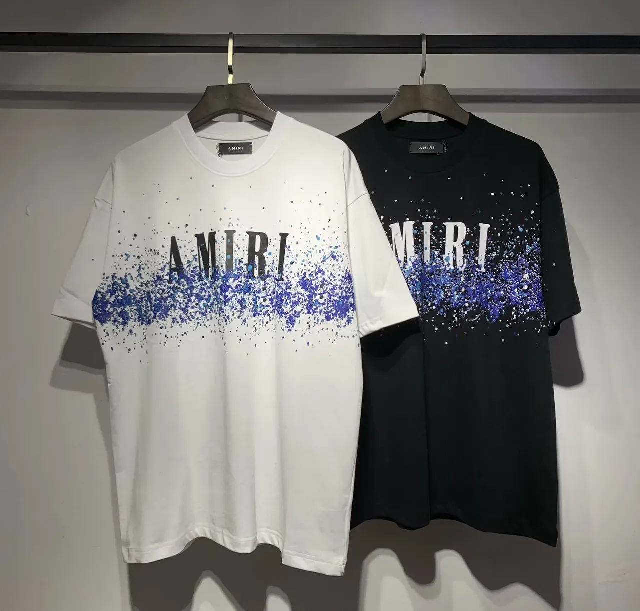 Camiseta Amiri com logo gráfico de respingos 12
