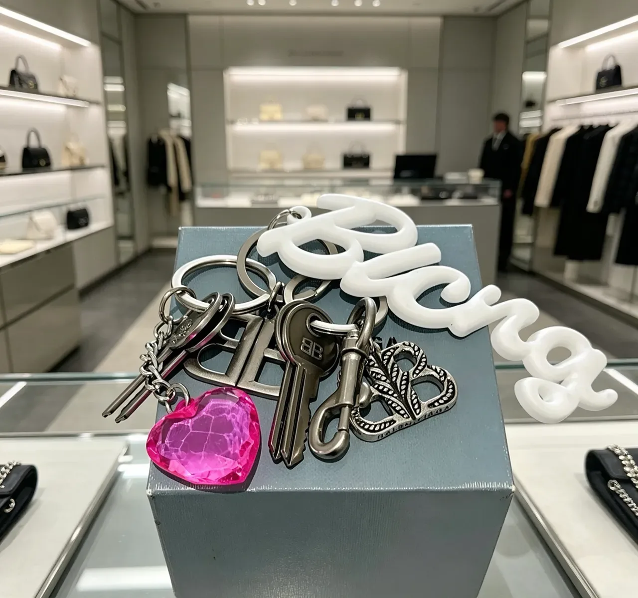 Balenciaga Keychain Collection White Silver Cursive Logo Metallic Monogram Bracelet 3