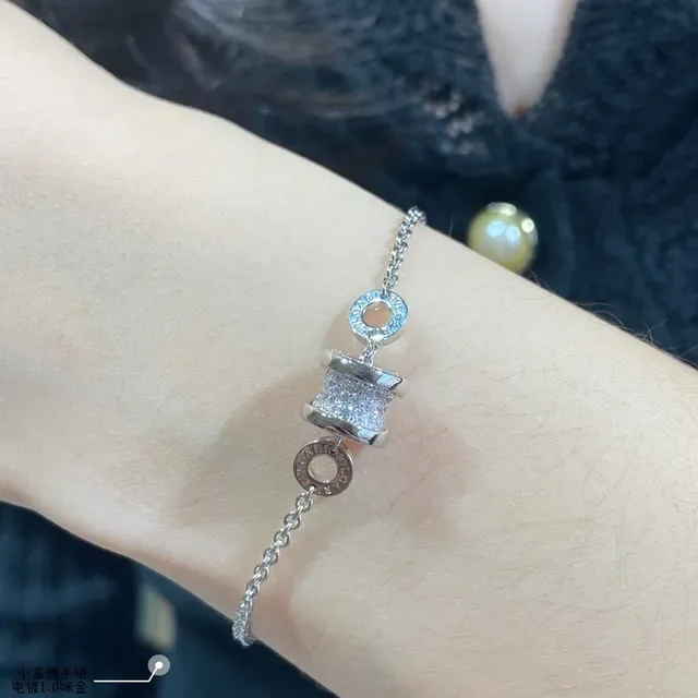 Bvlgari B.zero1 金银色 圆柱形 Pavé 魅力 刻字 Logo 戒指手链 8