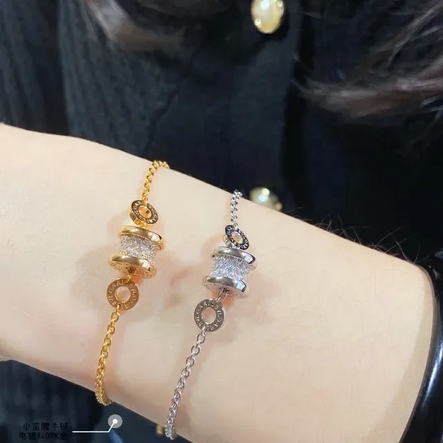 Bvlgari B.zero1 金银色 圆柱形 Pavé 魅力 刻字 Logo 戒指手链 9